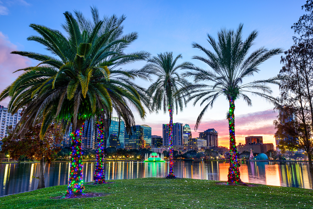 Orlando, Florida, USA downtown skyline at Eola Lake