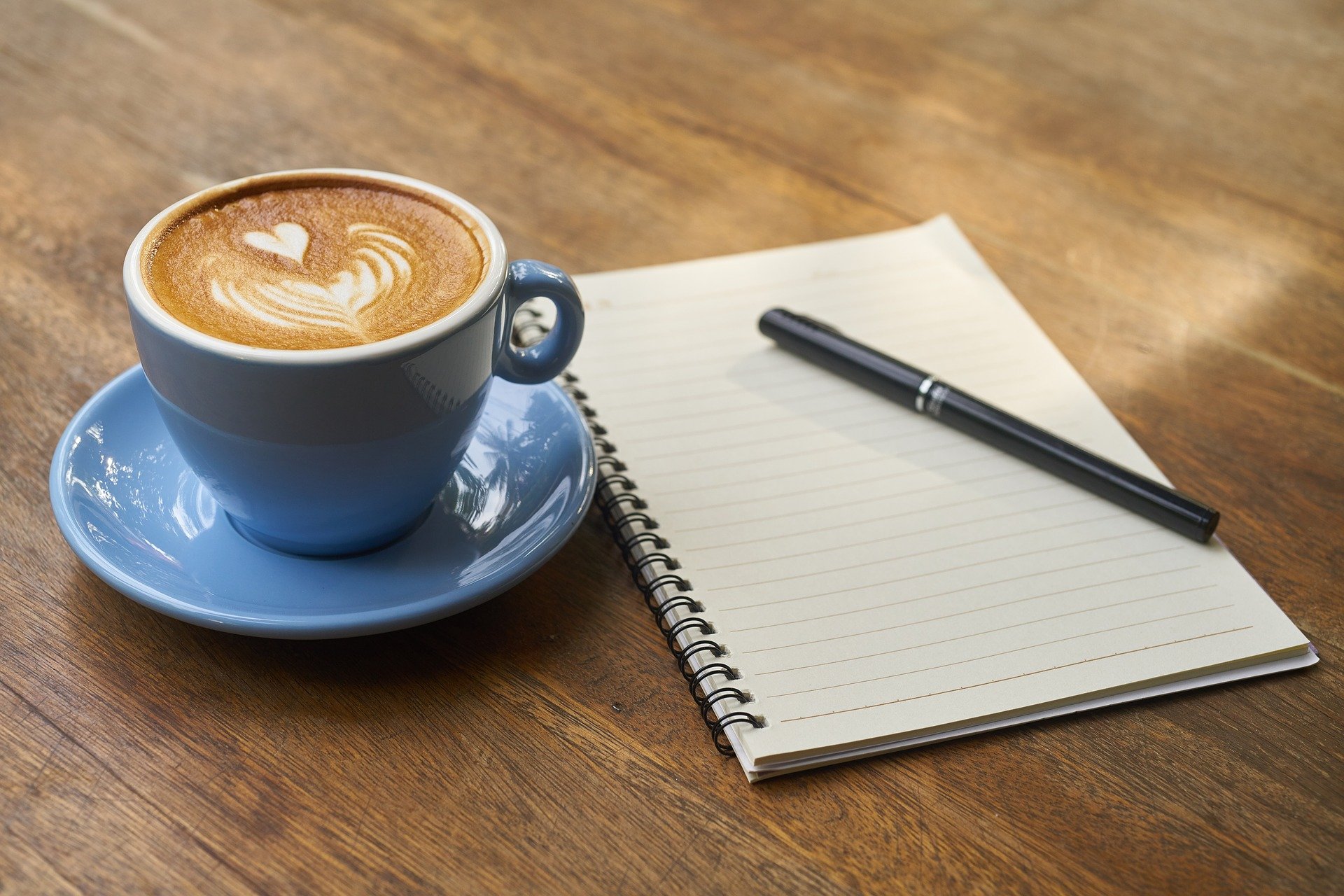 coffee, notebook, pen