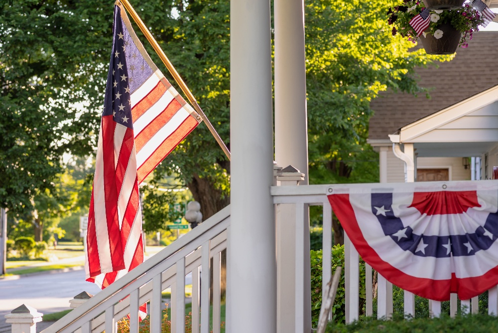 US flag on a suburban porch